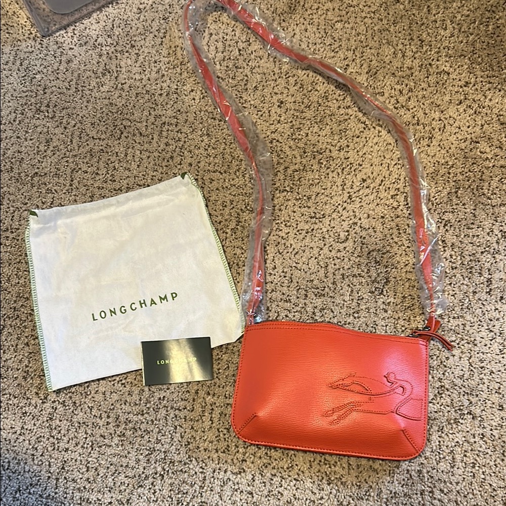 Longchamp Le Pliage Cuir Small Crossbody Bag in Coral
